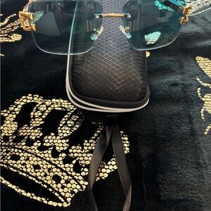 Gold and Blue Rimless Sunglasses